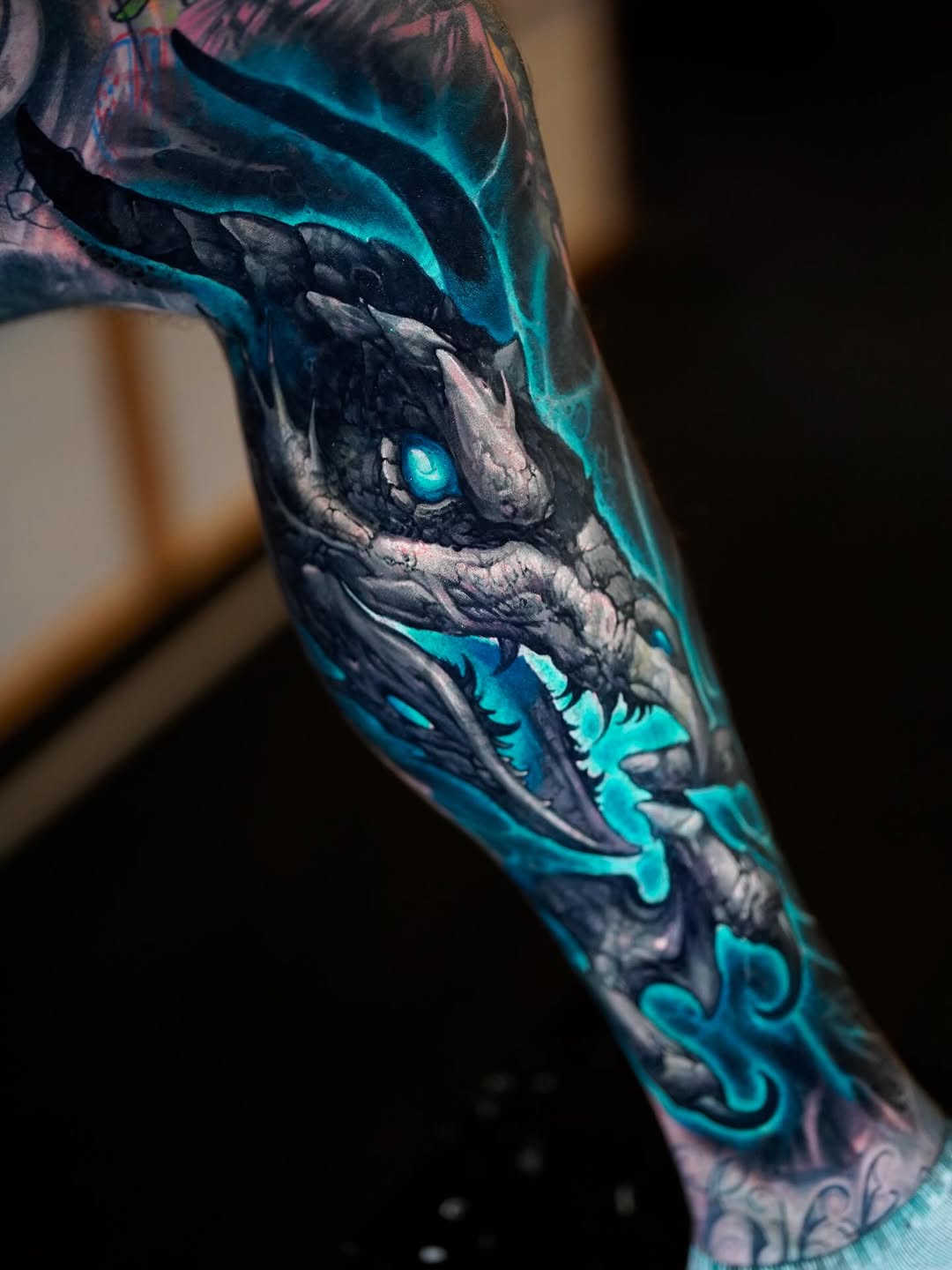 Bio-mechanical arm, blue glow, freehand